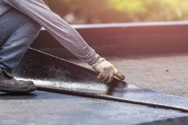 Professional Basement Waterproofing technician working in Rose, NY